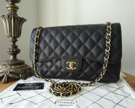 chanel black flap bag gold|The Chanel Black Bag: Timeless Addition to Every Collection.